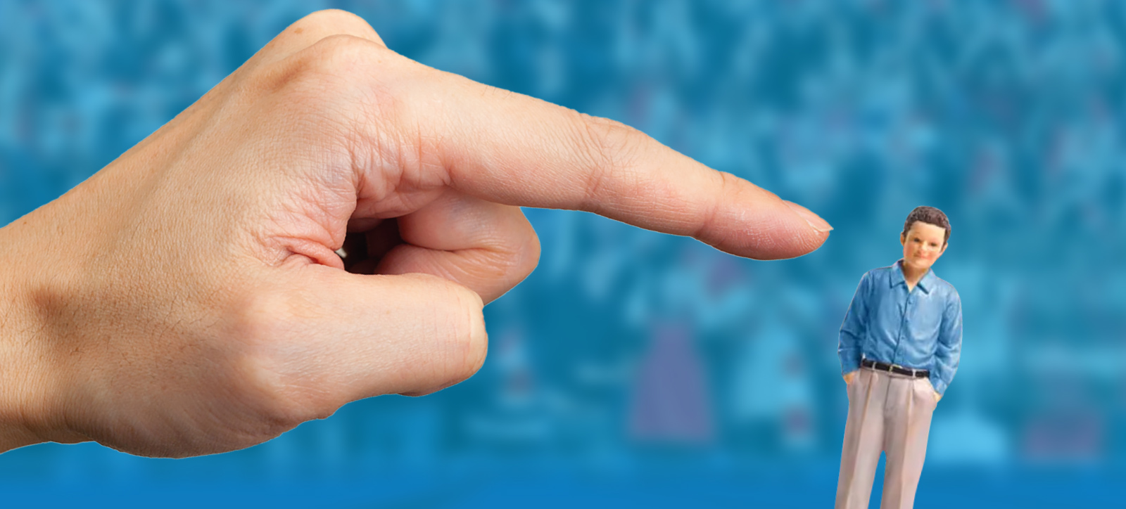 A giant hand with a pointing index finger nudges a subbuteo style figure in casual clothes. A giant hand with a pointing index finger nudges a subbuteo style figure in casual clothes.