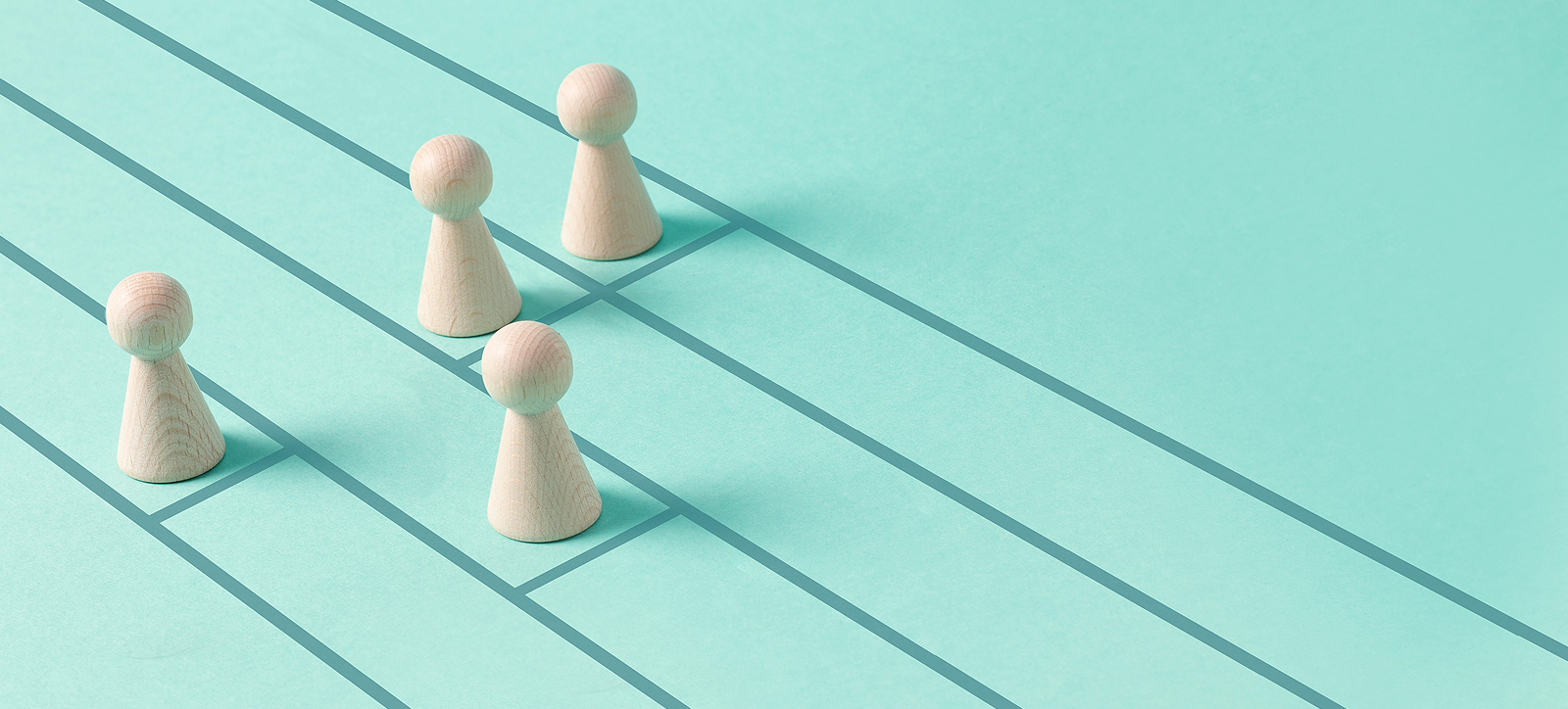 Gaming counters lined up in running lines, with one leading the others in the race for survival. Gaming counters lined up in running lines, with one leading the others in the race for survival.