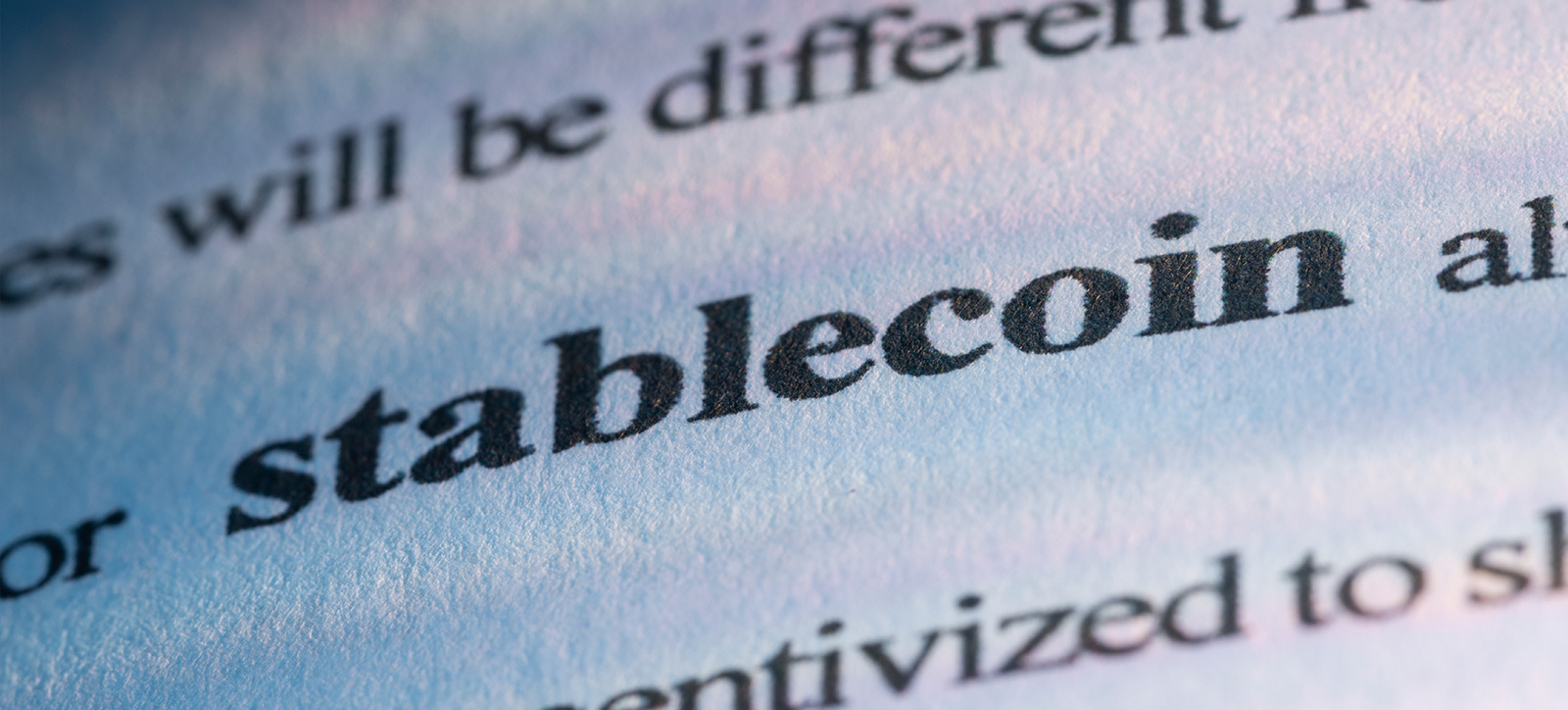 A dictionary page with the word stablecoin highlighted. A dictionary page with the word stablecoin highlighted.