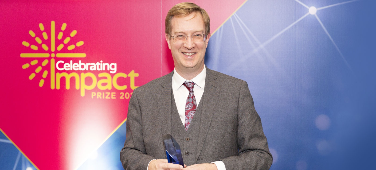 With his award With his award