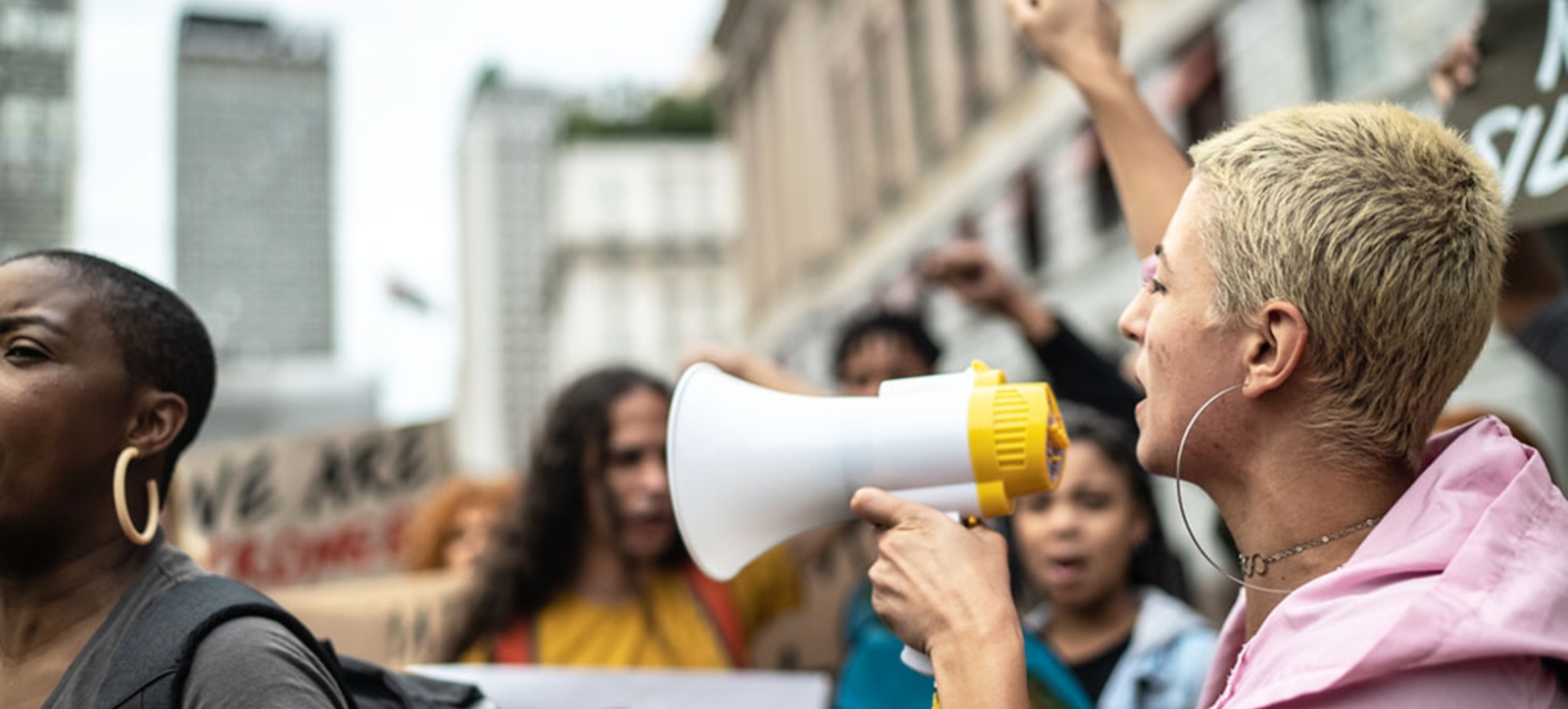 Workers protest over pay and conditions while taking industrial action. Workers protest over pay and conditions while taking industrial action.