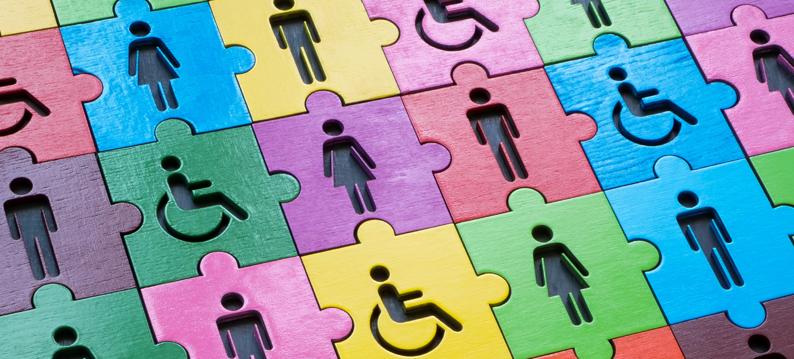 A jigsaw of different coloured tiles showing male, female, and disabled workers, representing diversity and inclusion in the workplace. A jigsaw of different coloured tiles showing male, female, and disabled workers, representing diversity and inclusion in the workplace.